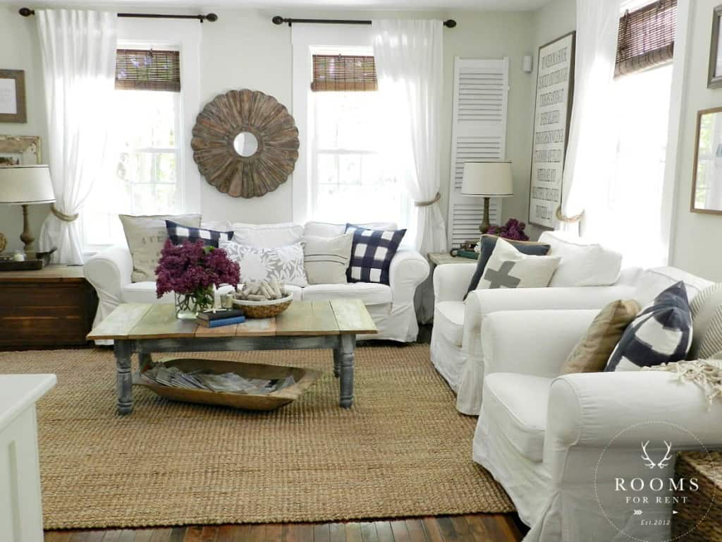 Love this neutral living room - it's so cozy with the white slipcovered furniture kellyelko.com