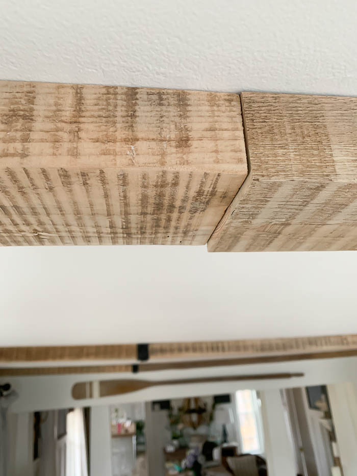 Installing wood beams in the living room